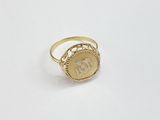 an image of a gold ring with the letter d on it