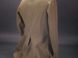the back view of a tan jacket with buttons on a mannequin mannequin mannequin mannequin mannequin mannequin mannequin