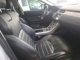 the interior of a car with black leather seats and a steering wheel