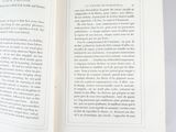 an open book with a picture of a cat on it