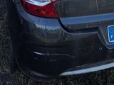a car that has a sticker on the back of it