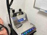 a machine that is sitting on a stand in a room