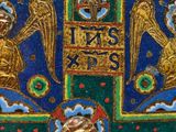an image of a gold and blue cross with angels on it