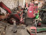 a picture of a red machine in a garage