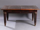 a small table with two drawers on top of it
