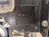 a close up of a meter on the side of a machine