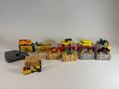 many different types of toy trucks and trucks on the table