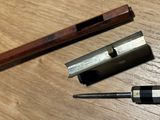 a small piece of wood that is laying on a table