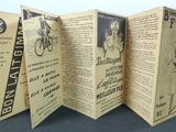 a folding book with a picture of a man on a bike