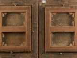 two open wooden doors that are next to each other