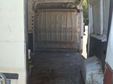 a white van that is parked inside of a building