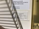 a sign on the side of a building stating that there is a water heater