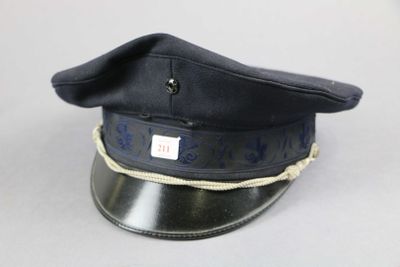 a black hat with blue writing on it sitting on a table