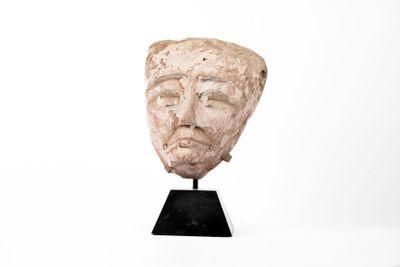 une image représentant une sculpture du visage d'un homme