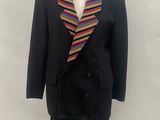 an image of a suit and tie on a mannequin