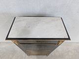 a black and gold side table with a marble top