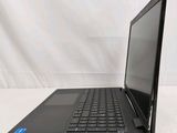 a laptop that is sitting on a white surface