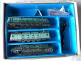 a box that has three trains inside of it