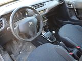 a car with a steering wheel and a dash board