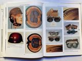 a book with pictures of different types of helmets and goggles
