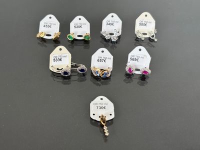 a group of small tags with a price tag attached to them