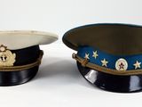 two hats sitting on top of each other on a table