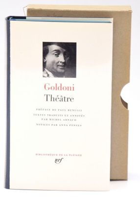 an image of a book sitting on top of a table next to a cup