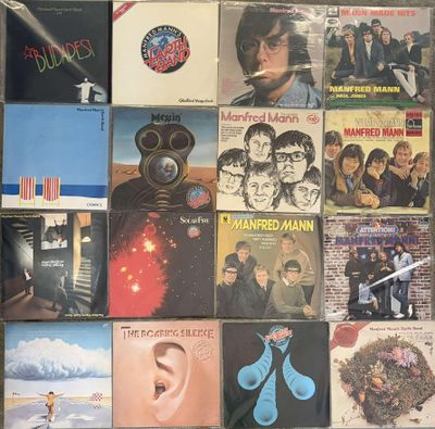 a lot of records on the wall of a room