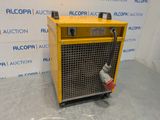 an image of a yellow air dryer sitting on top of a floor