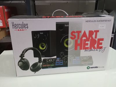 a box with a stereo system and headphones on it