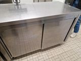 a stainless steel counter in a commercial kitchen