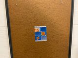 a picture of a picture hanging on a bulletin board