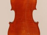 an old violin with a wooden back and a long neck