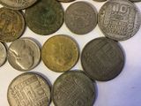 a lot of coins that are sitting on a table