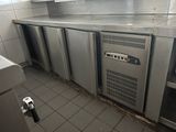an image of a commercial kitchen with stainless steel appliances