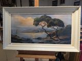 a picture of a painting on a easel in a room