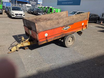 an image of a dump truck parked in a parking lot