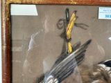 a picture of a picture of a bird in a frame