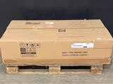 a cardboard box sitting on a pallet on the floor