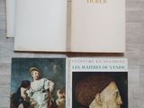 three books on a wooden table with pictures of people and a dog