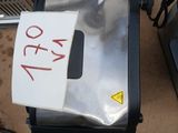 a toaster and a toaster on a table with a price tag on it