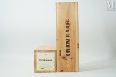 a wooden box with a label on it next to a wooden box with a label on it