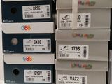 several boxes of printer ink are stacked on top of each other