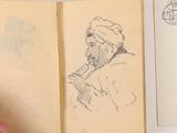 a drawing of a man in a turban on a book