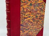 an image of a red book with a gold and red cover