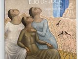 une photo d'un livre sur laquelle figurent une femme et deux hommes