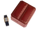 a red box with a watch on it and a red box with a watch on it