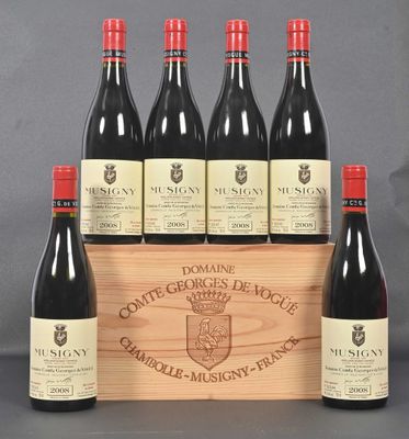 six bottles of red wine in a wooden box