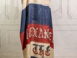 an image of a flag draped over a mannequin