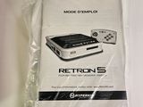 a box with a game controller in it sitting on a table